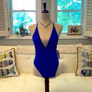 One piece bathing suit by BIKINILAB. NWT. Size Med. Purple